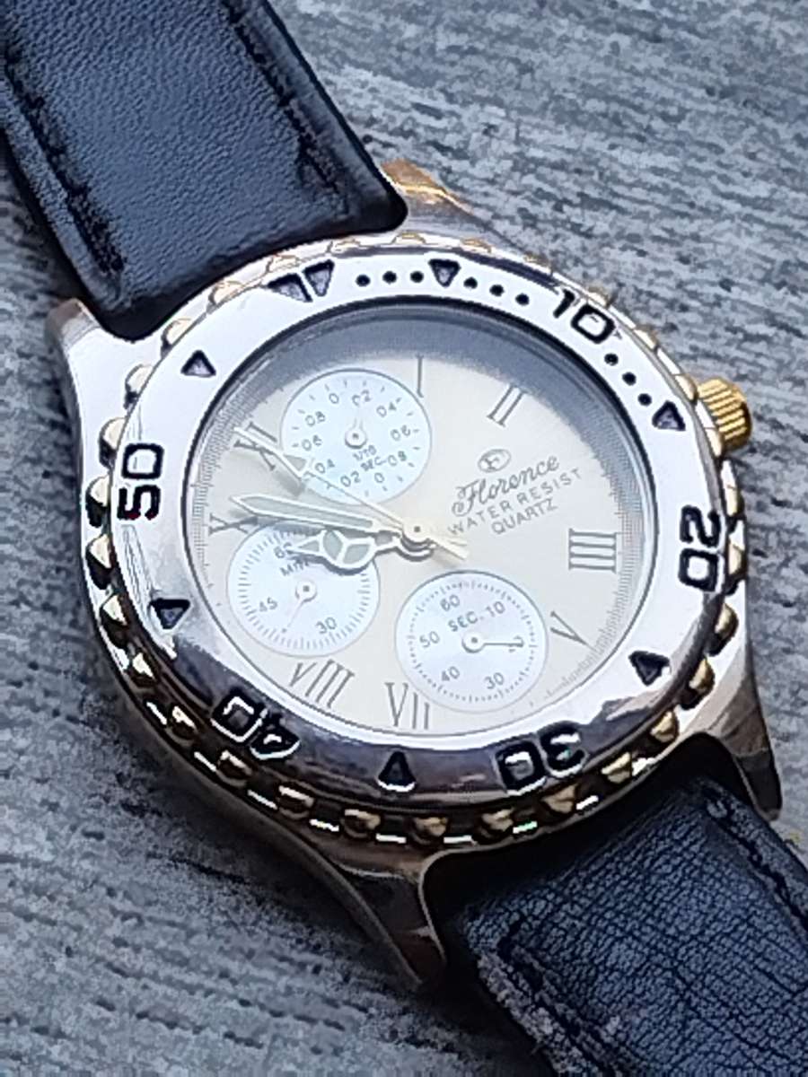 ELEGANT LADIES FLORENCE WATCH WITH ROTATING BEZEL IN EXCELLENT WORKING CONDITION