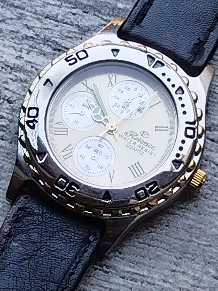 ELEGANT LADIES FLORENCE WATCH WITH ROTATING BEZEL IN EXCELLENT WORKING CONDITION