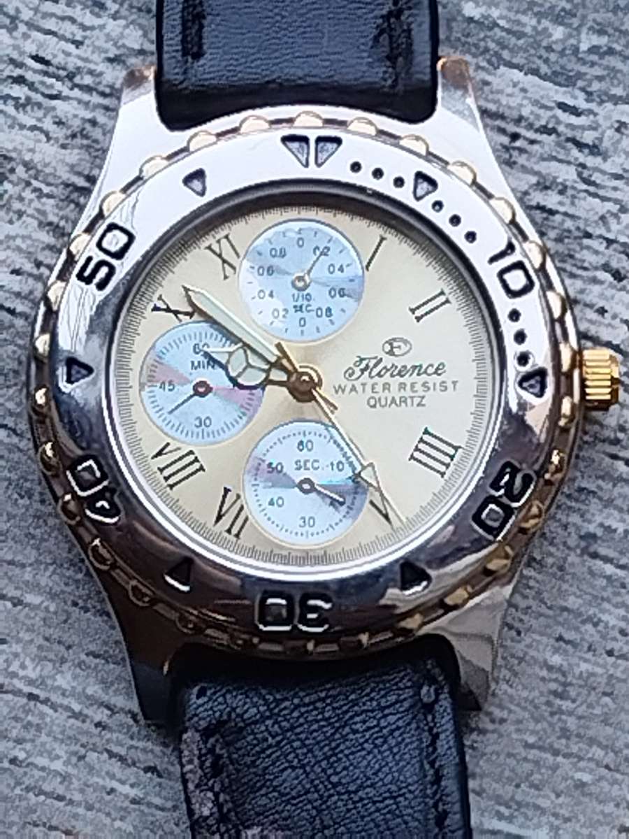 ELEGANT LADIES FLORENCE WATCH WITH ROTATING BEZEL IN EXCELLENT WORKING CONDITION