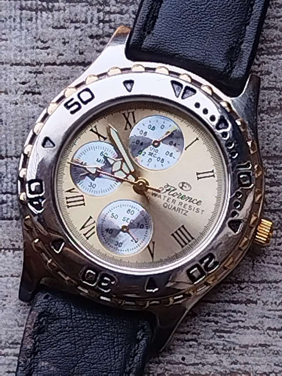 ELEGANT LADIES FLORENCE WATCH WITH ROTATING BEZEL IN EXCELLENT WORKING CONDITION