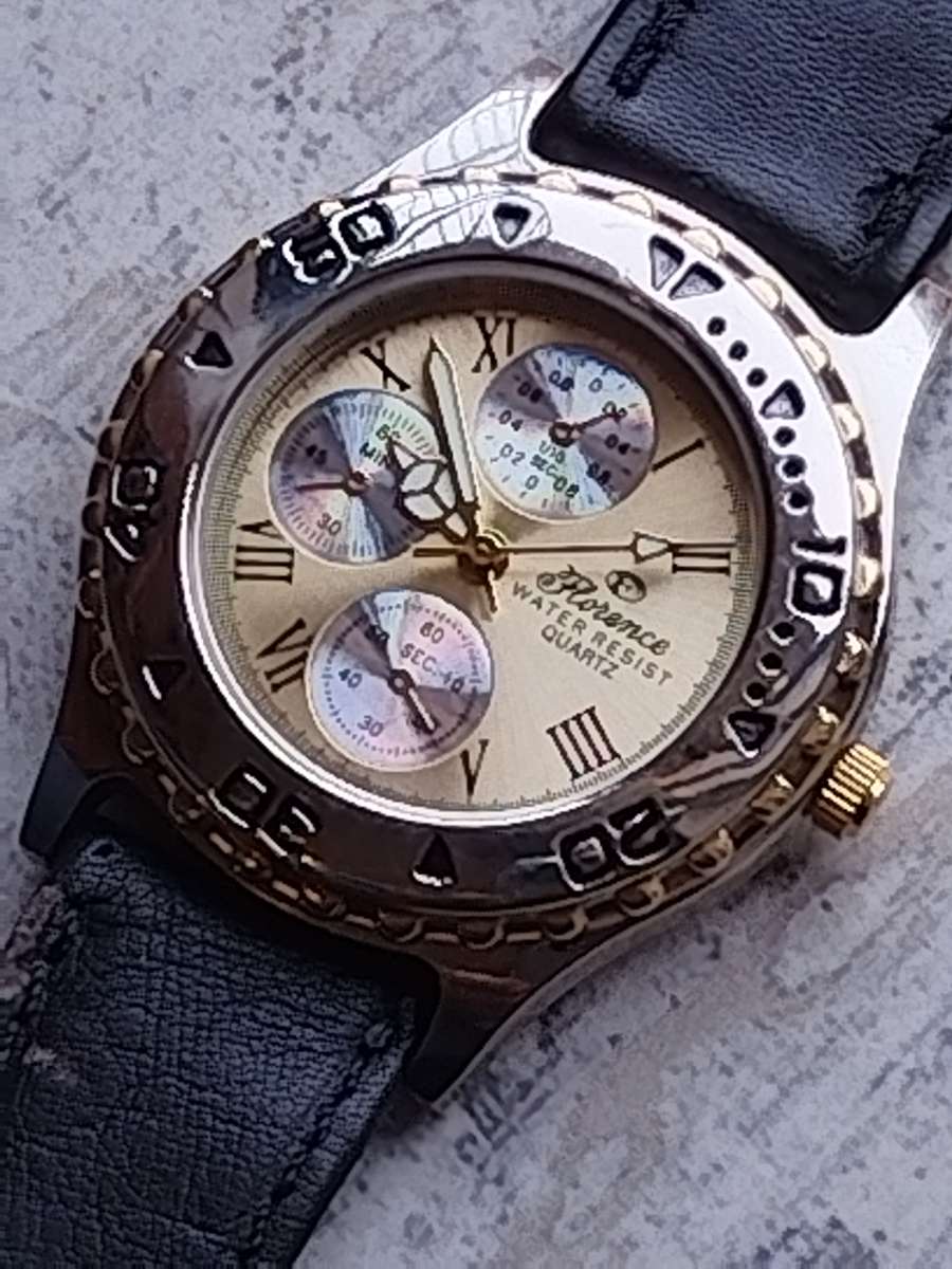 ELEGANT LADIES FLORENCE WATCH WITH ROTATING BEZEL IN EXCELLENT WORKING CONDITION