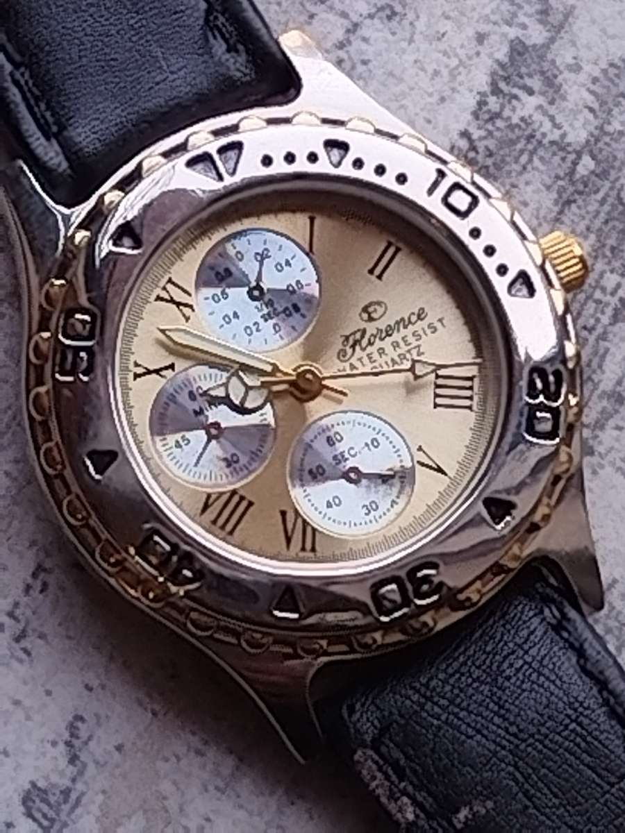 ELEGANT LADIES FLORENCE WATCH WITH ROTATING BEZEL IN EXCELLENT WORKING CONDITION