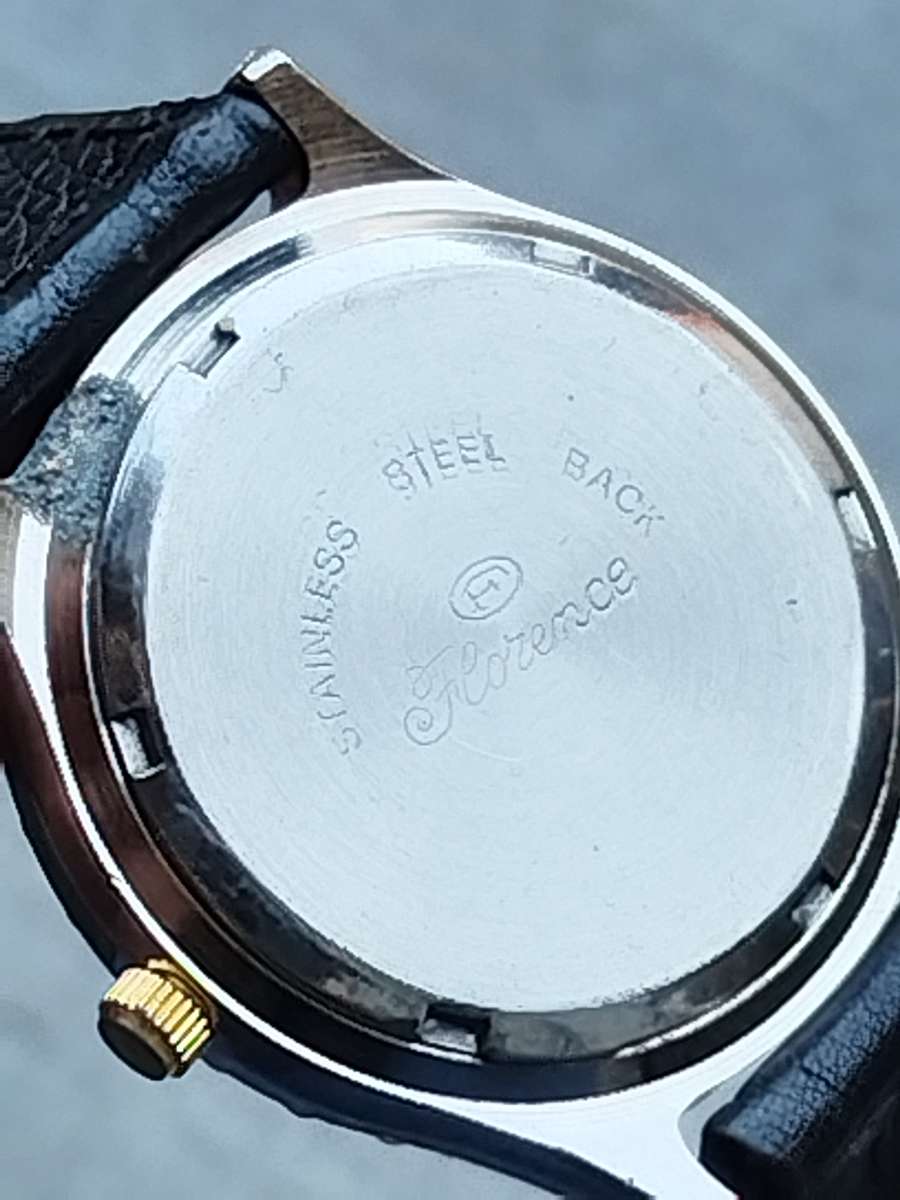 ELEGANT LADIES FLORENCE WATCH WITH ROTATING BEZEL IN EXCELLENT WORKING CONDITION