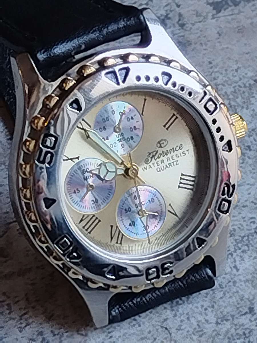 ELEGANT LADIES FLORENCE WATCH WITH ROTATING BEZEL IN EXCELLENT WORKING CONDITION