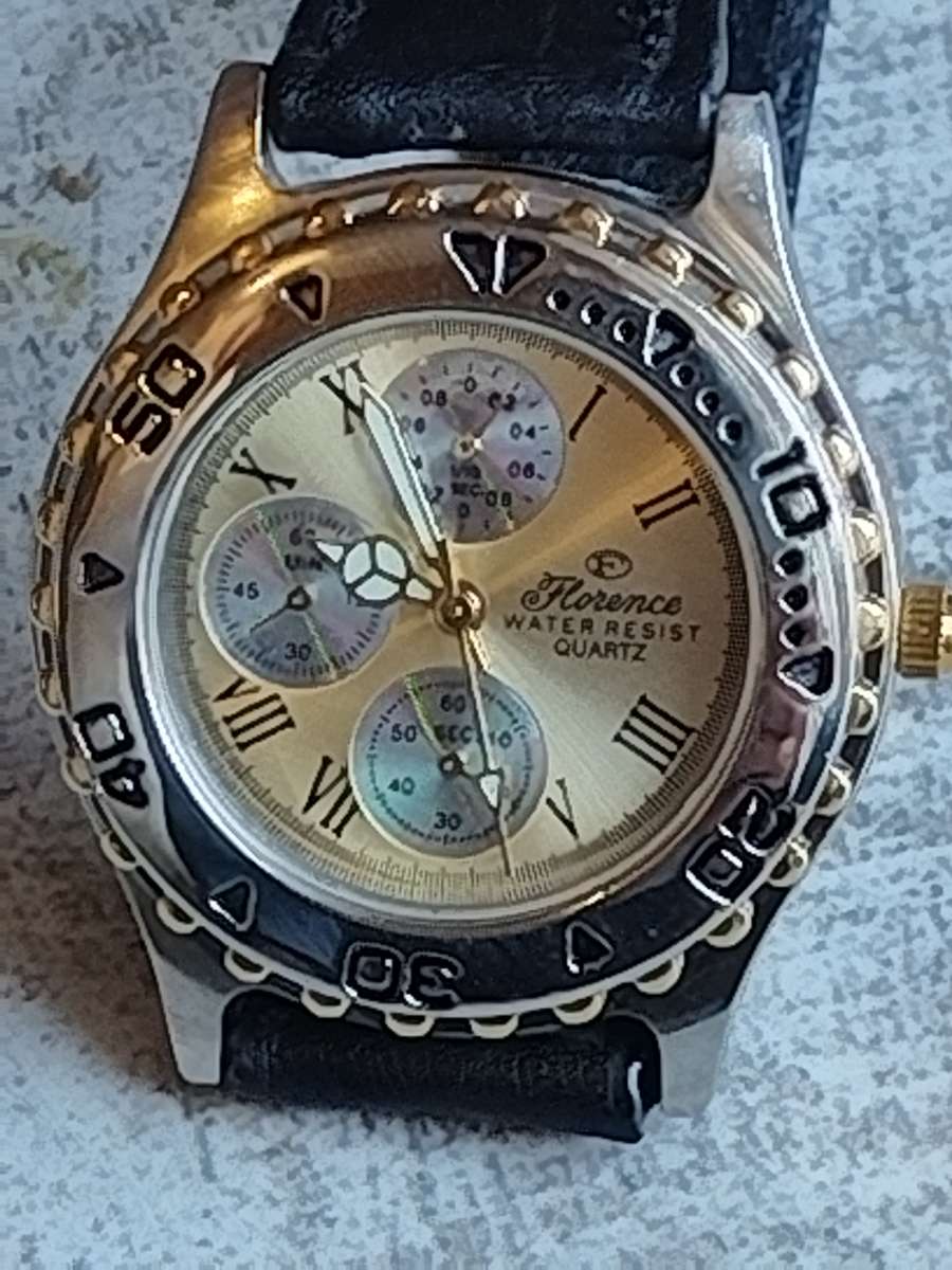 ELEGANT LADIES FLORENCE WATCH WITH ROTATING BEZEL IN EXCELLENT WORKING CONDITION