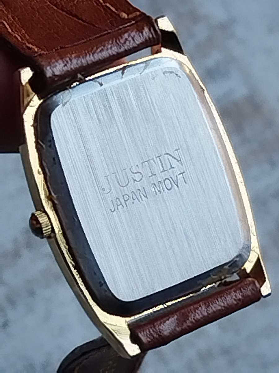 LADIES GOLD JUSTIN WATCH IN EXCELLENT WORKING CONDITION