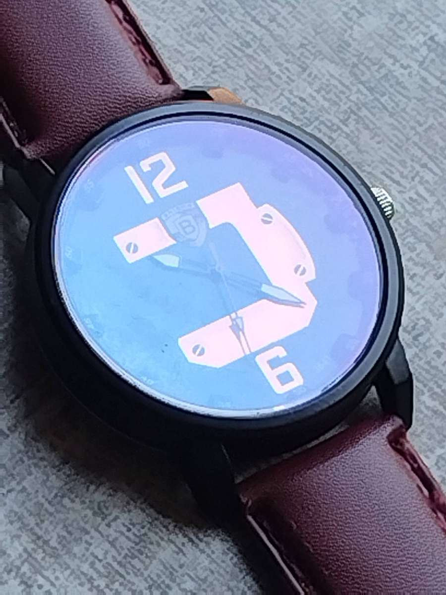 MENS BULKY BAISHA FASHION WATCH IN EXCELLENT WORKING CONDITION