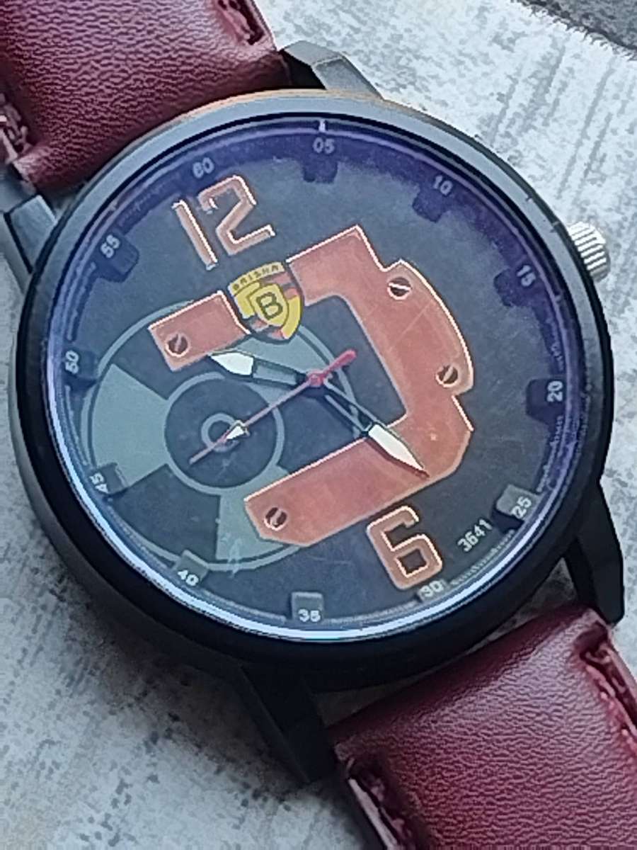 MENS BULKY BAISHA FASHION WATCH IN EXCELLENT WORKING CONDITION