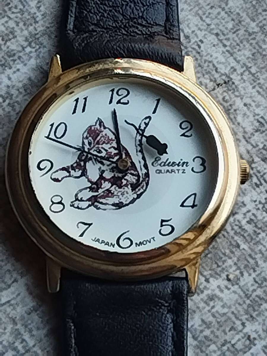 MENS VINTAGE EDWIN GOLD CAT AND MOUSE WATCH IN EXCELLENT WORKING CONDITION