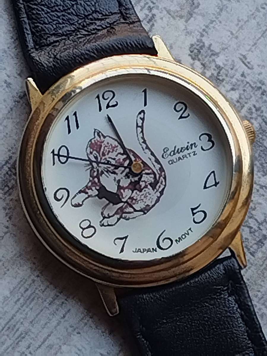 MENS VINTAGE EDWIN GOLD CAT AND MOUSE WATCH IN EXCELLENT WORKING CONDITION