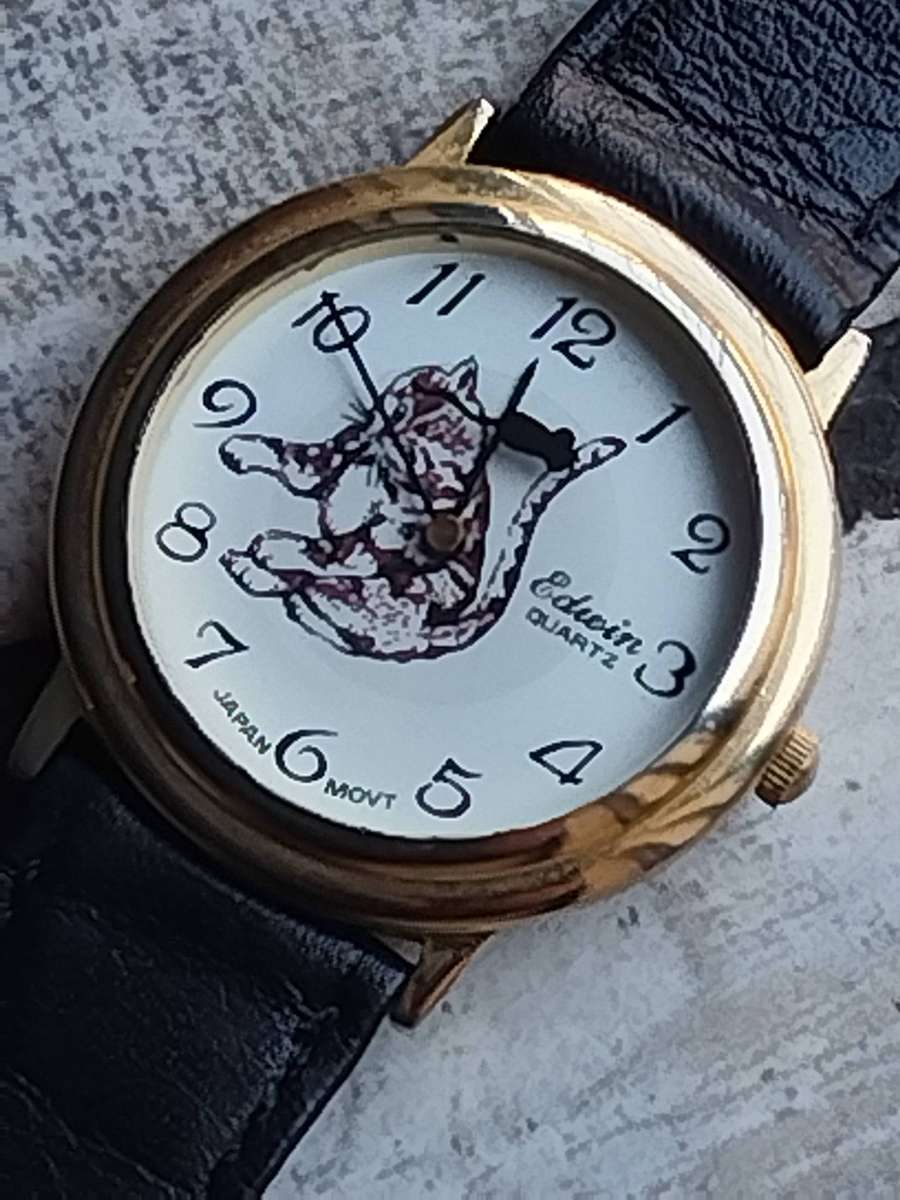 MENS VINTAGE EDWIN GOLD CAT AND MOUSE WATCH IN EXCELLENT WORKING CONDITION