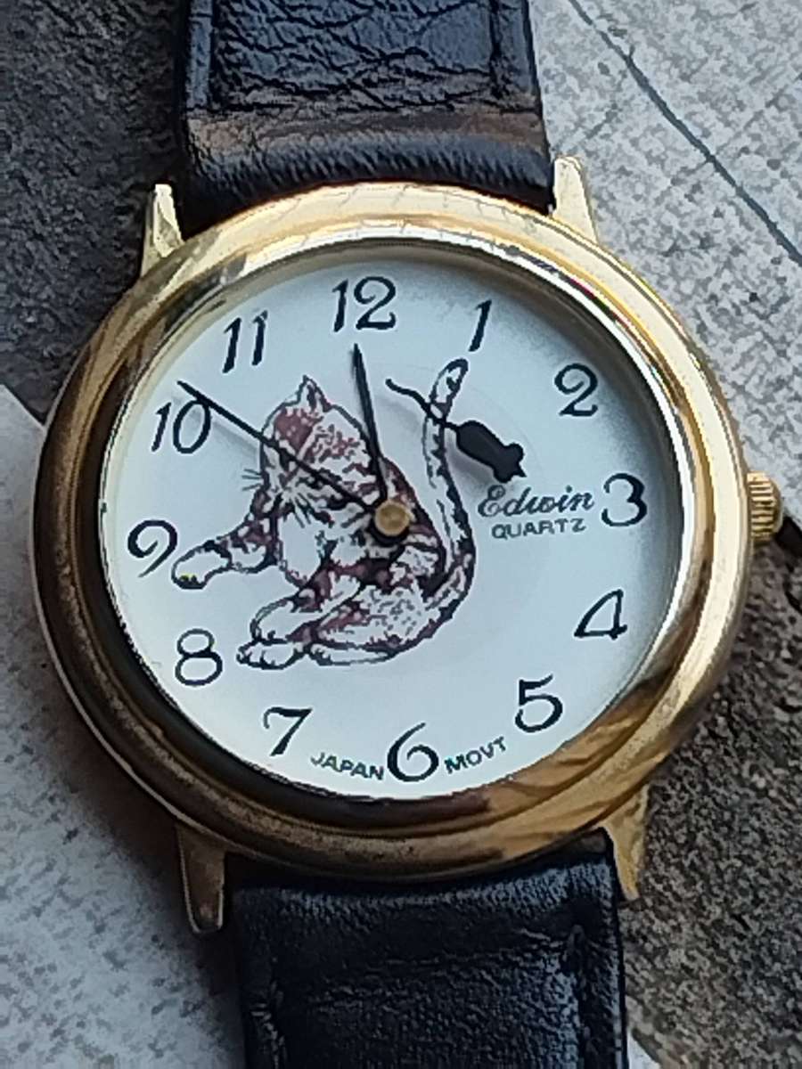 MENS VINTAGE EDWIN GOLD CAT AND MOUSE WATCH IN EXCELLENT WORKING CONDITION