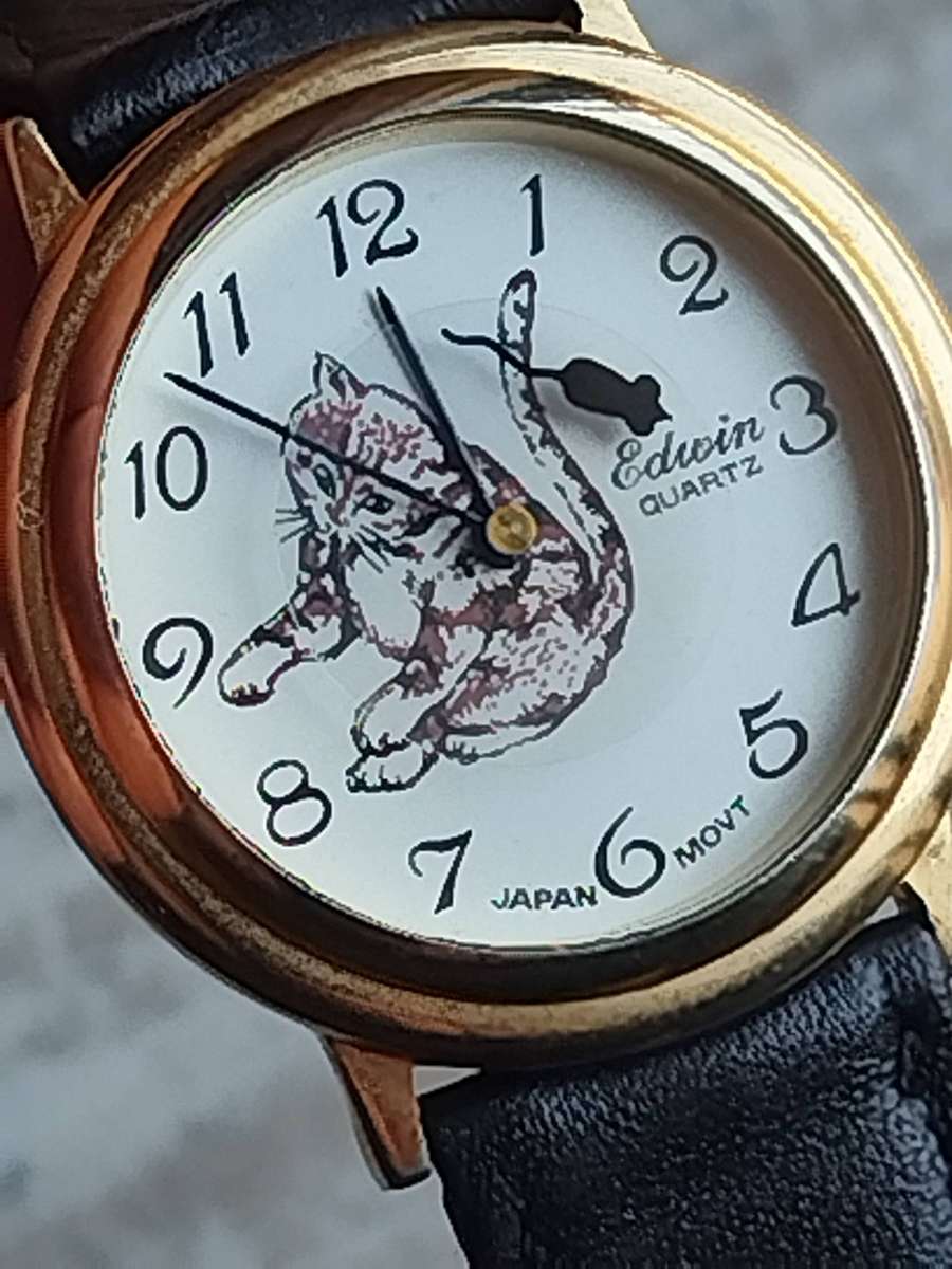 MENS VINTAGE EDWIN GOLD CAT AND MOUSE WATCH IN EXCELLENT WORKING CONDITION