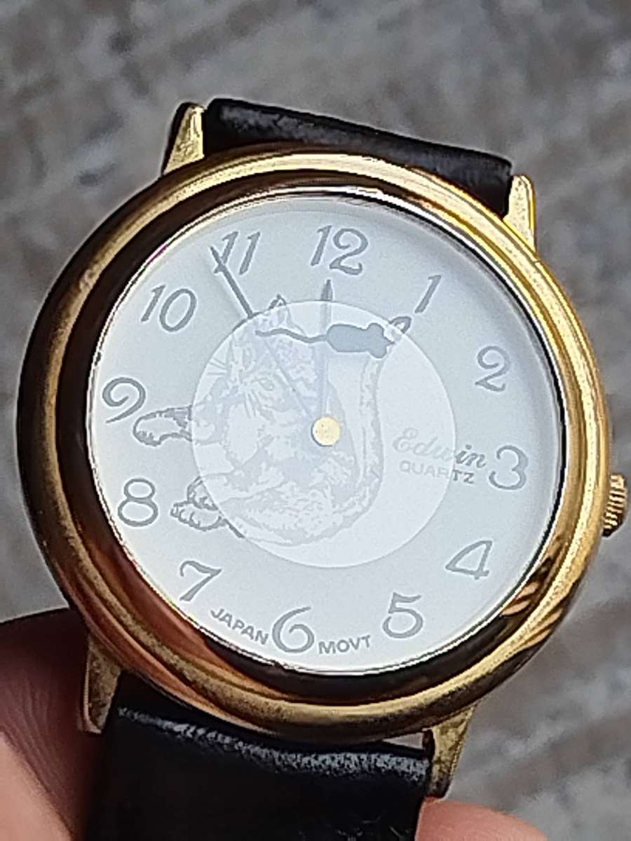 MENS VINTAGE EDWIN GOLD CAT AND MOUSE WATCH IN EXCELLENT WORKING CONDITION