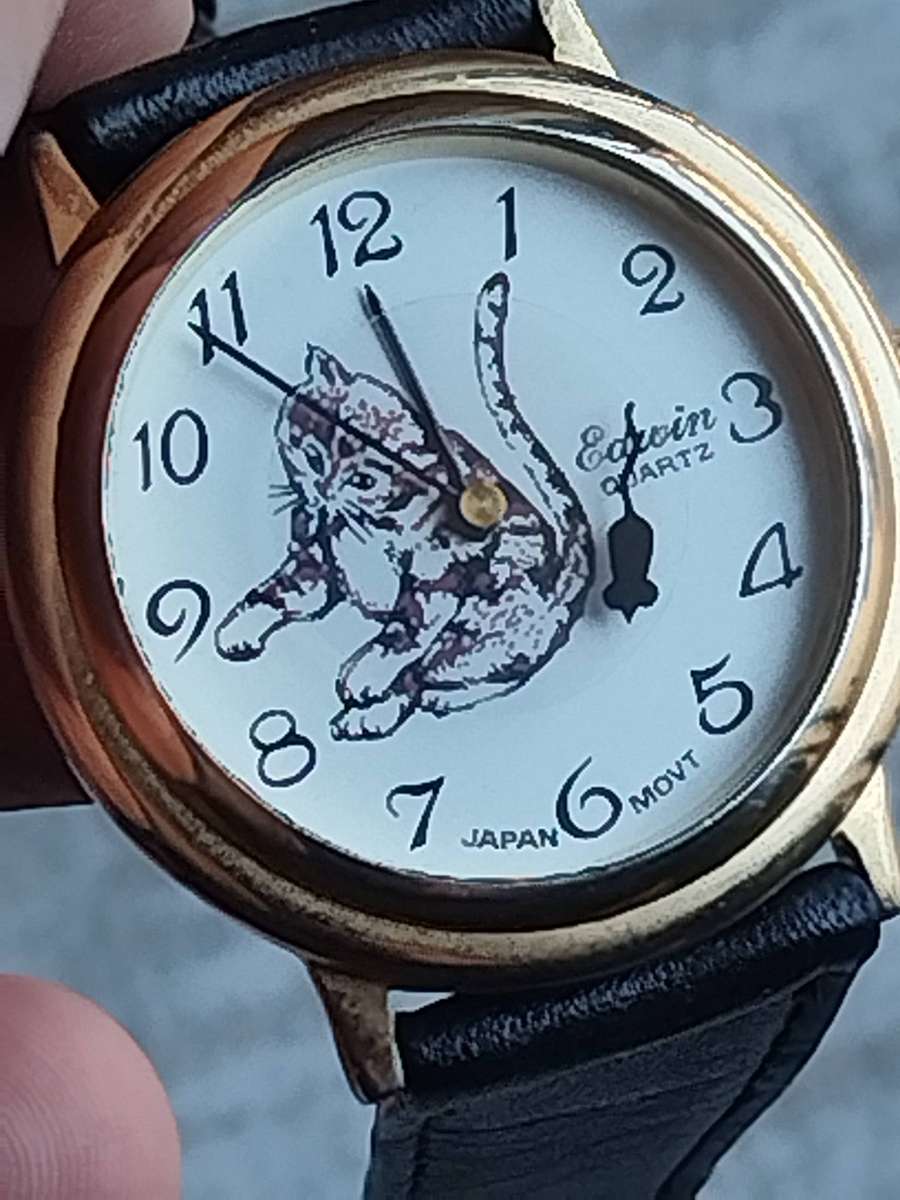 MENS VINTAGE EDWIN GOLD CAT AND MOUSE WATCH IN EXCELLENT WORKING CONDITION