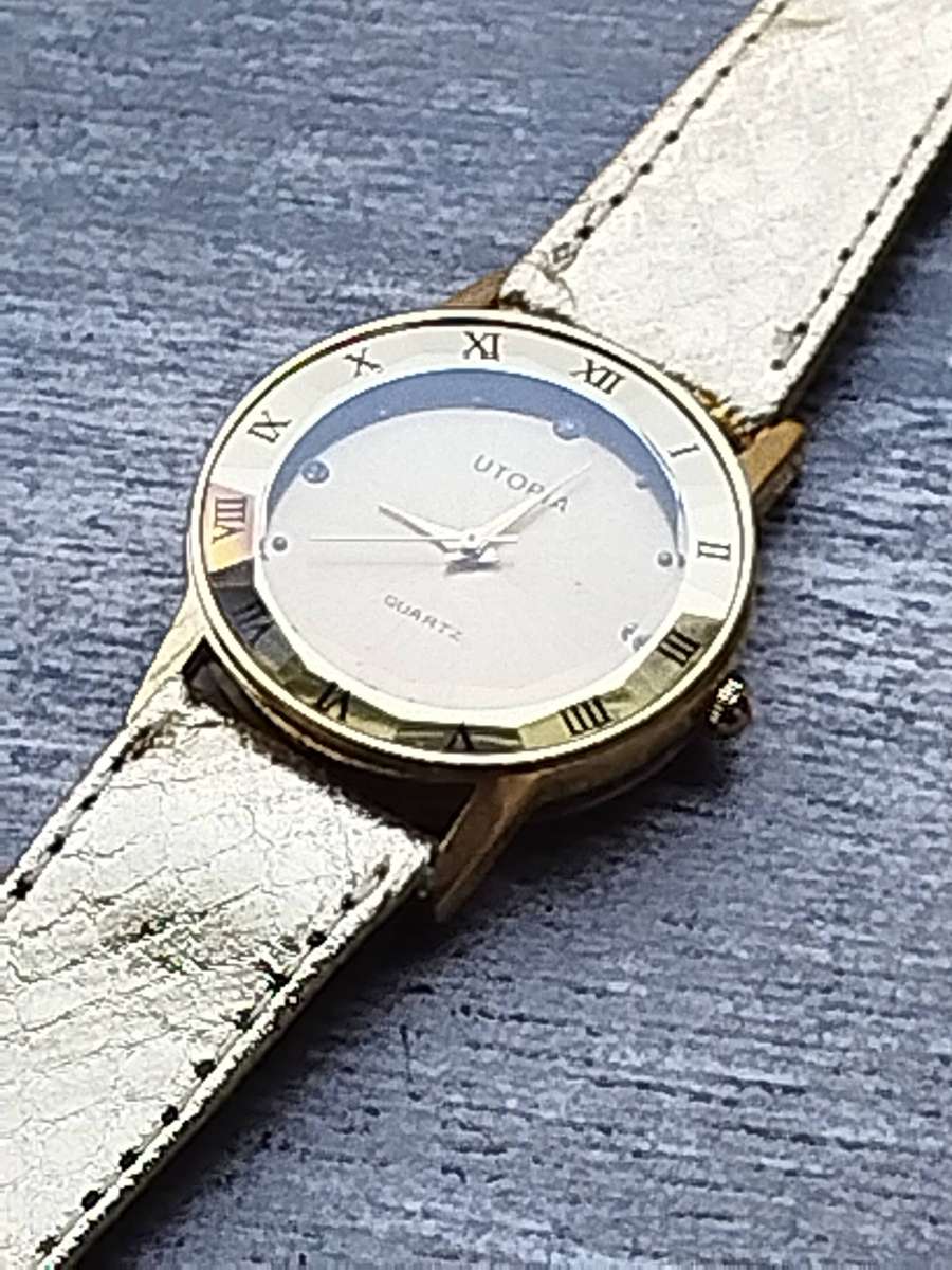 STUNNING AND ELEGANT LADIES UTOPIA ALL GOLD WATCH IN EXCELLENT WORKING CONDITION