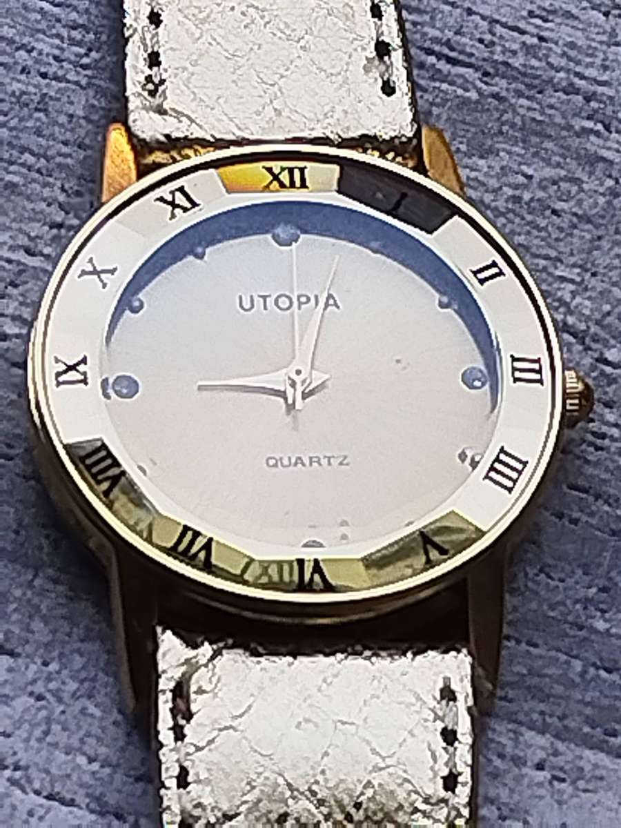 STUNNING AND ELEGANT LADIES UTOPIA ALL GOLD WATCH IN EXCELLENT WORKING CONDITION