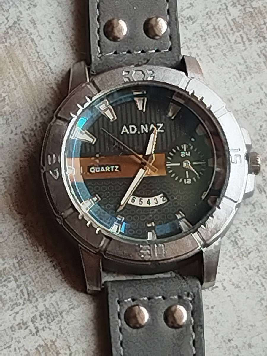 MENS FASHION AD NAZ WATCH WITH DATE FUNCTION IN EXCELLENT WORKING CONDITION