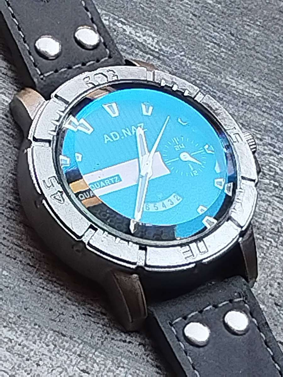 MENS FASHION AD NAZ WATCH WITH DATE FUNCTION IN EXCELLENT WORKING CONDITION
