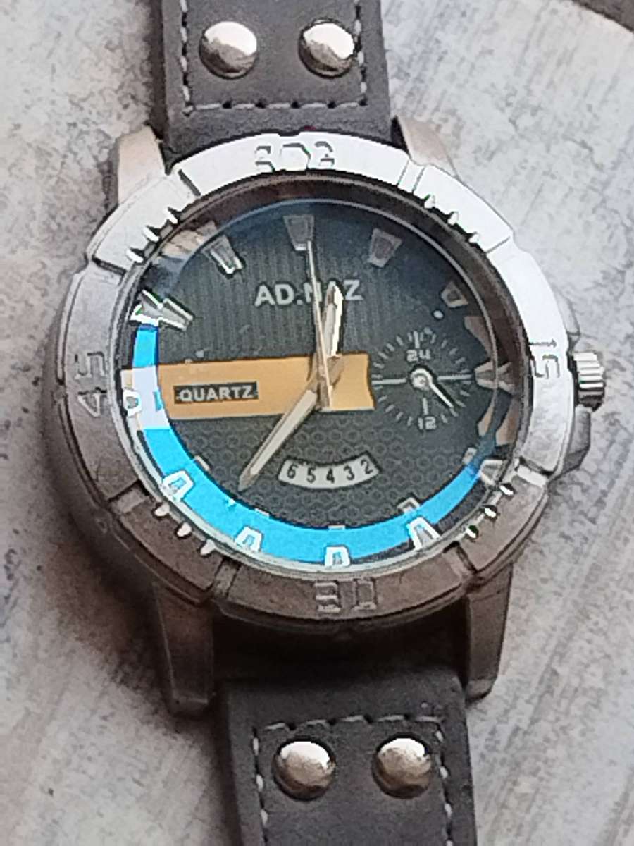 MENS FASHION AD NAZ WATCH WITH DATE FUNCTION IN EXCELLENT WORKING CONDITION