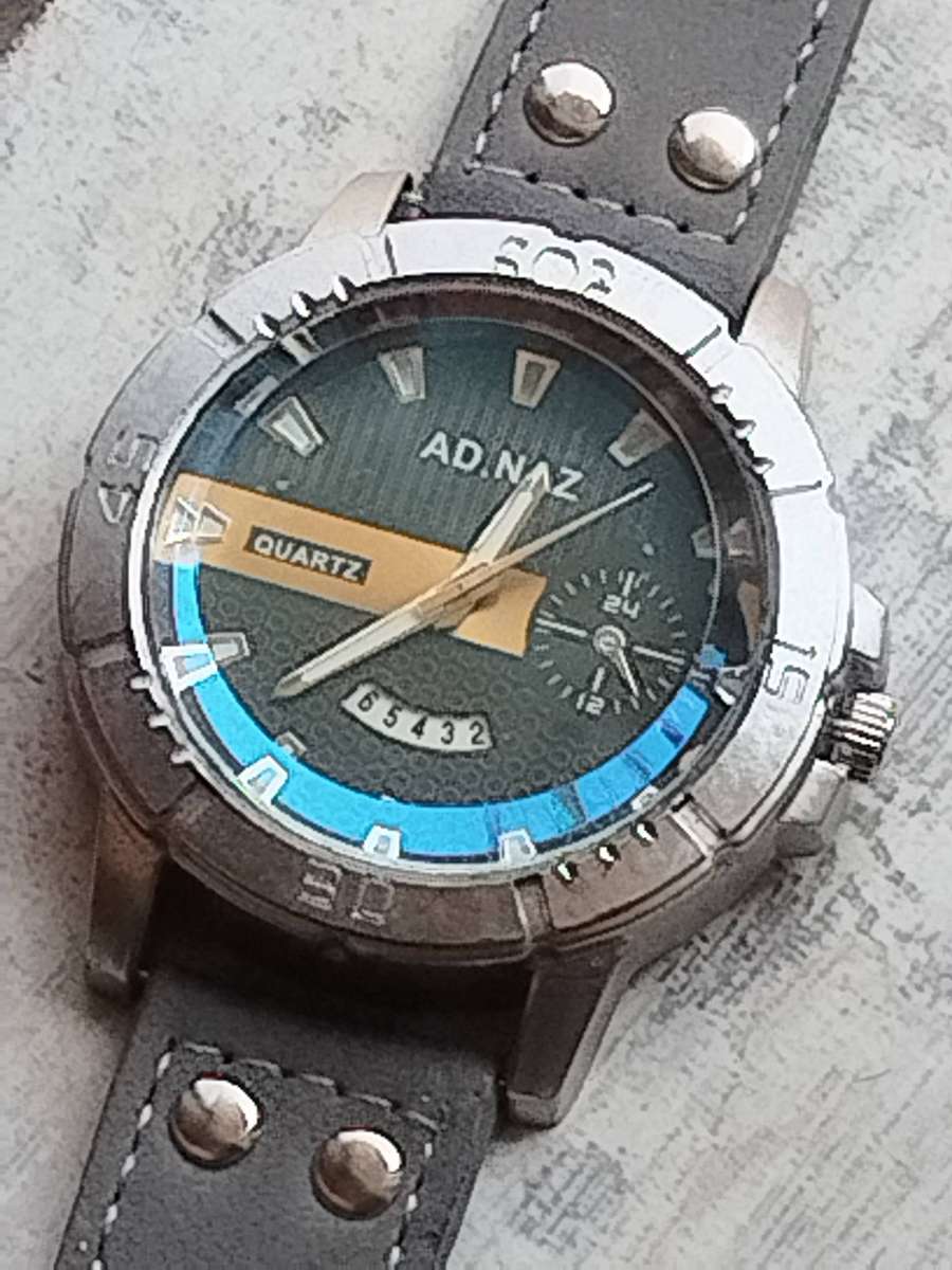 MENS FASHION AD NAZ WATCH WITH DATE FUNCTION IN EXCELLENT WORKING CONDITION