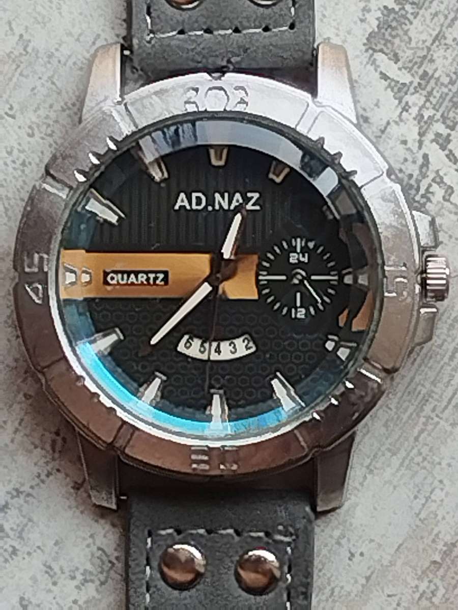 MENS FASHION AD NAZ WATCH WITH DATE FUNCTION IN EXCELLENT WORKING CONDITION