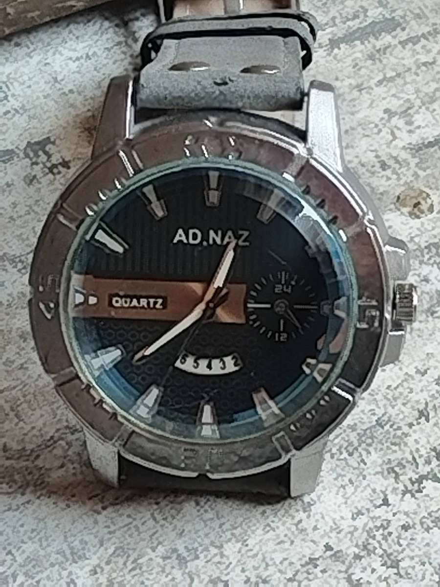 MENS FASHION AD NAZ WATCH WITH DATE FUNCTION IN EXCELLENT WORKING CONDITION