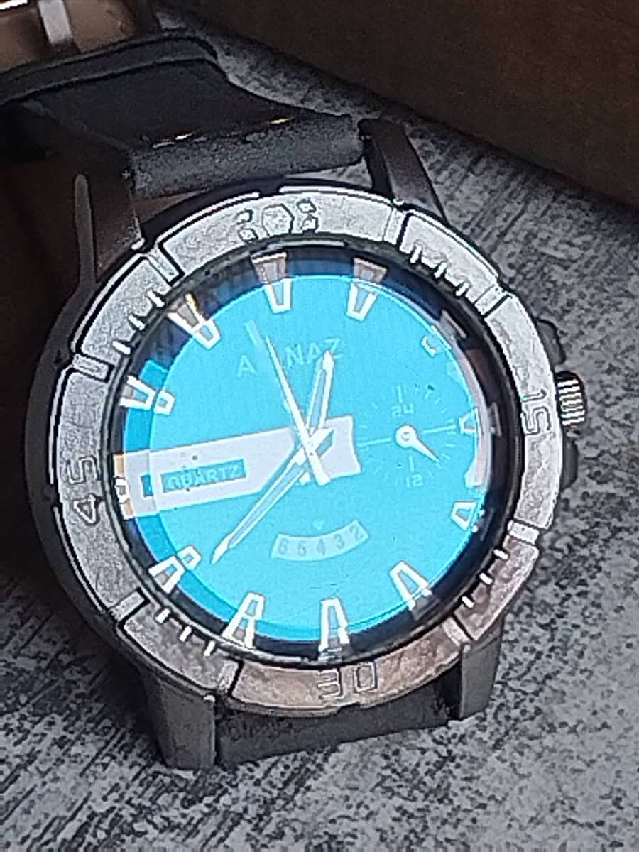 MENS FASHION AD NAZ WATCH WITH DATE FUNCTION IN EXCELLENT WORKING CONDITION