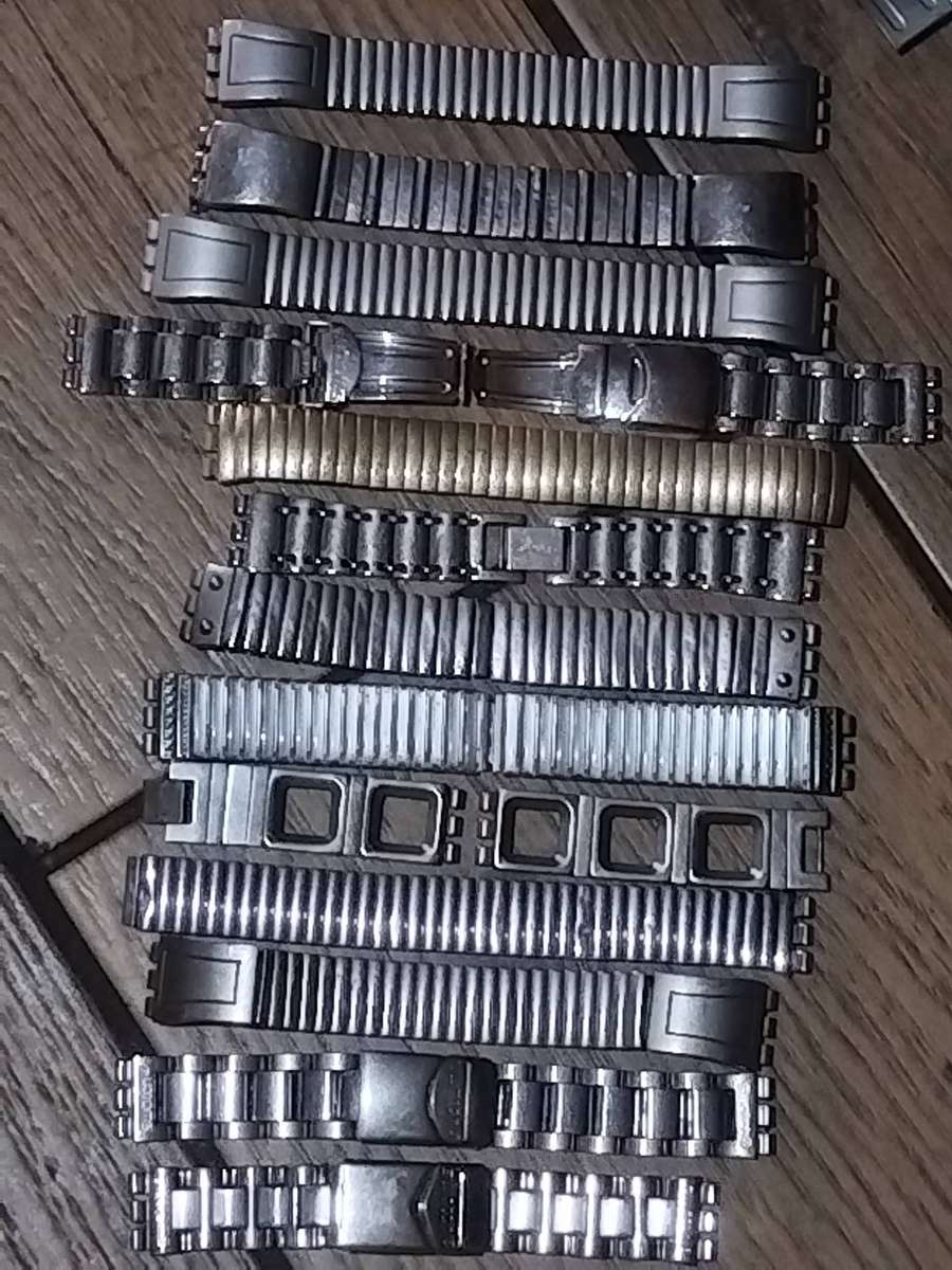 SWATCH WATCH CASINGS AND STRAPS - BIDDING FOR ALL