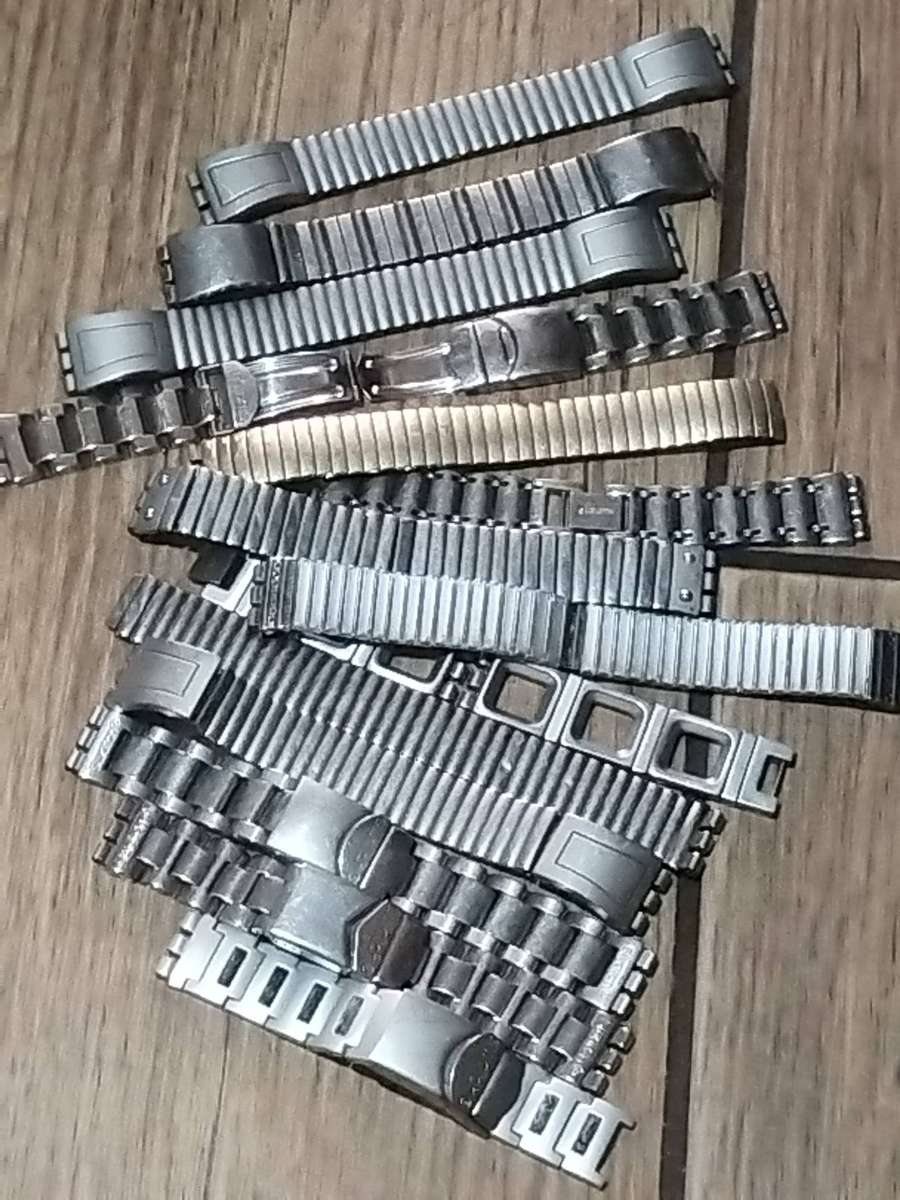 SWATCH WATCH CASINGS AND STRAPS - BIDDING FOR ALL