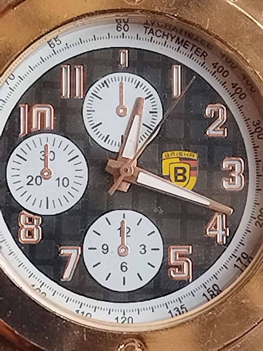 MENS FASHION BAISHA HUGE FACE GOLD WATCH IN EXCELLENT WORKING CONDITION