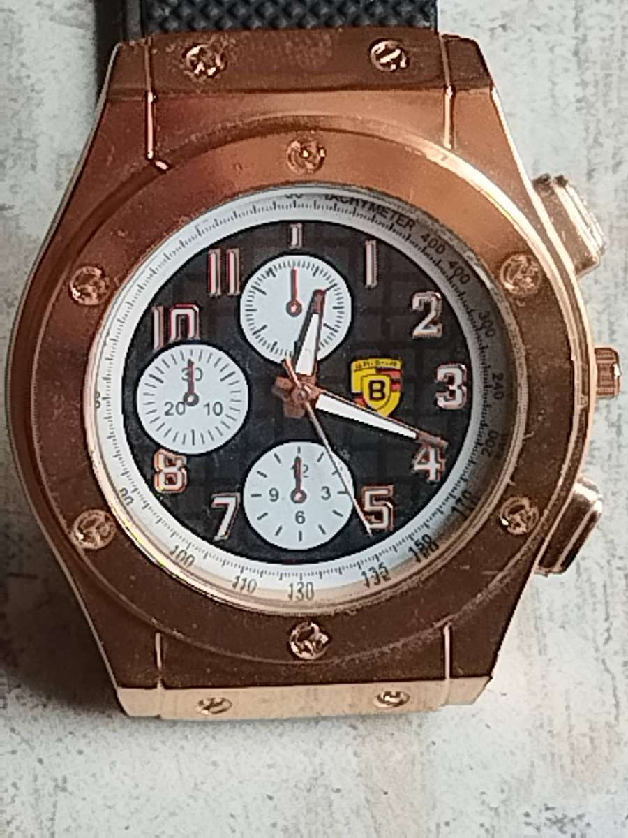 MENS FASHION BAISHA HUGE FACE GOLD WATCH IN EXCELLENT WORKING CONDITION