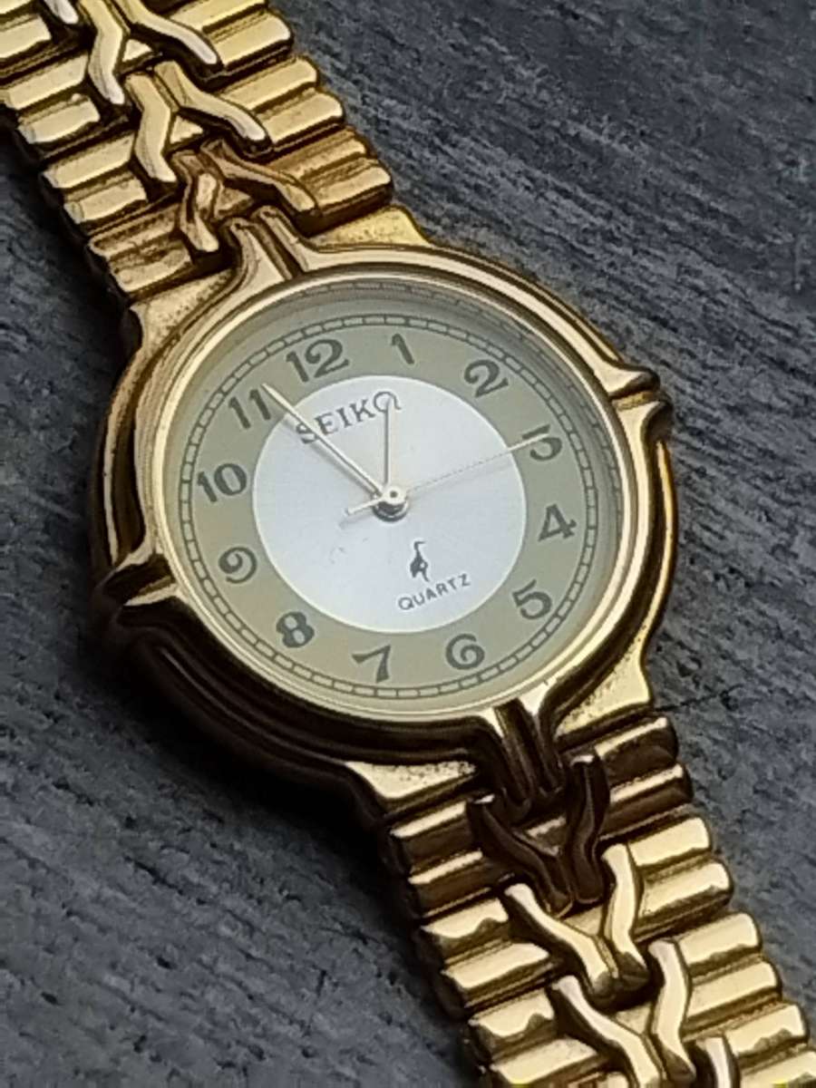 MENS SEIKQ GOLD WATCH IN EXCELLENT WORKING CONDITION