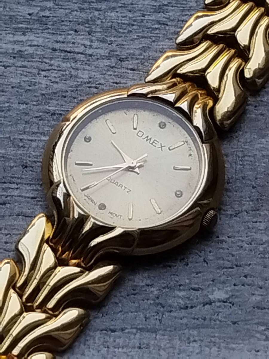 MENS GOLD OMEX WATCH IN EXCELLENT WORKING CONDITION