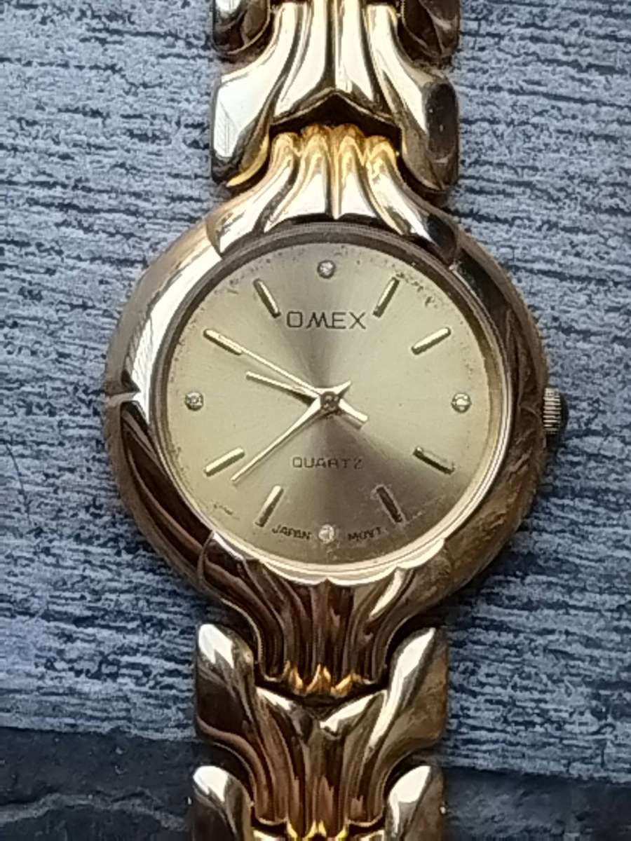 MENS GOLD OMEX WATCH IN EXCELLENT WORKING CONDITION
