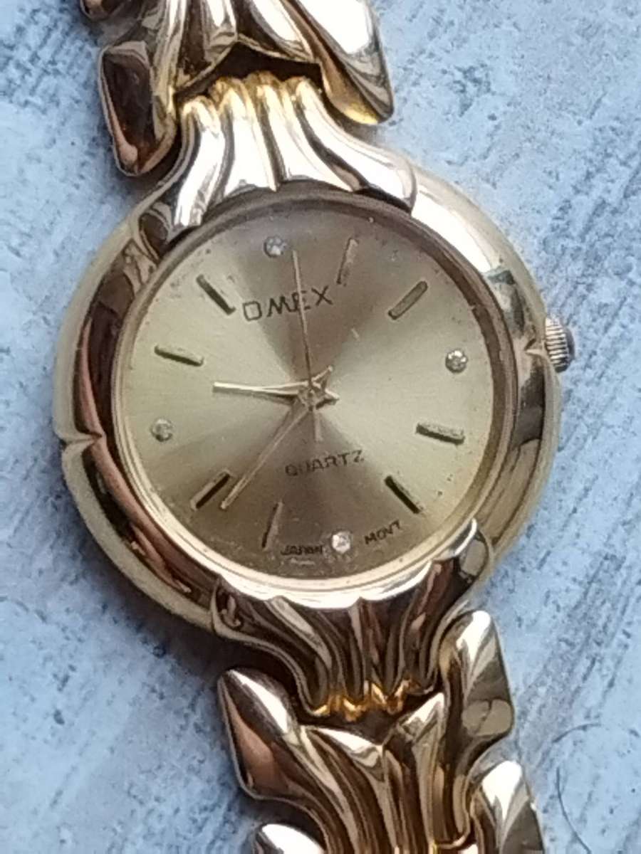MENS GOLD OMEX WATCH IN EXCELLENT WORKING CONDITION