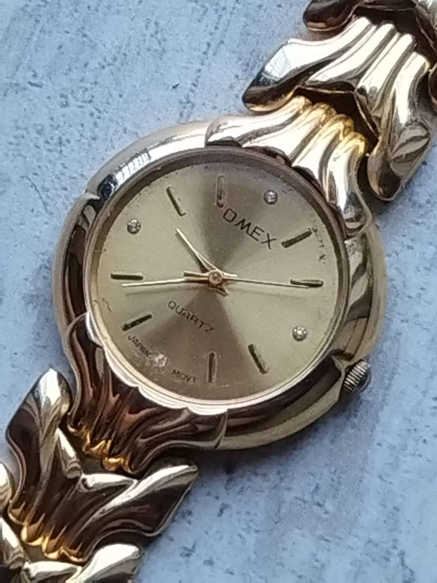 MENS GOLD OMEX WATCH IN EXCELLENT WORKING CONDITION
