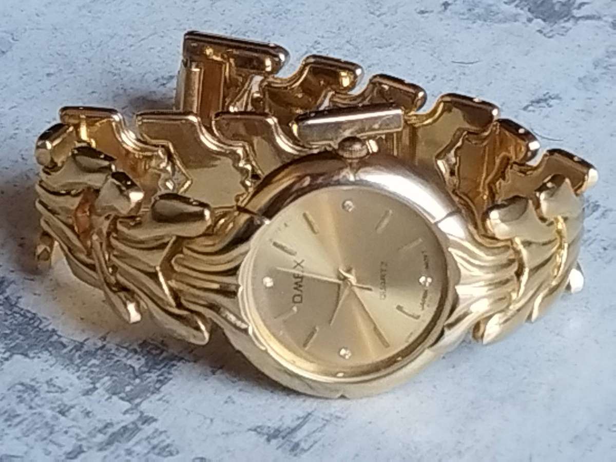 MENS GOLD OMEX WATCH IN EXCELLENT WORKING CONDITION