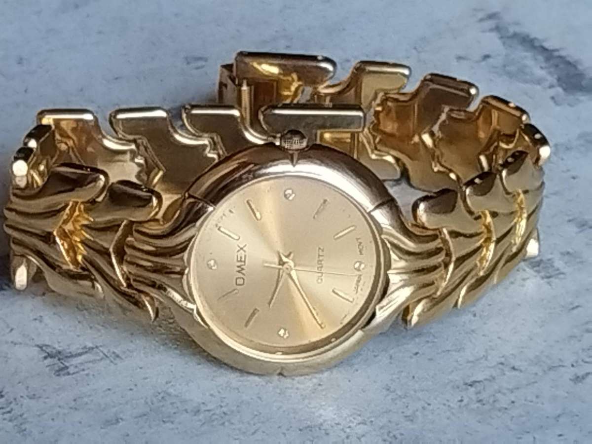 MENS GOLD OMEX WATCH IN EXCELLENT WORKING CONDITION