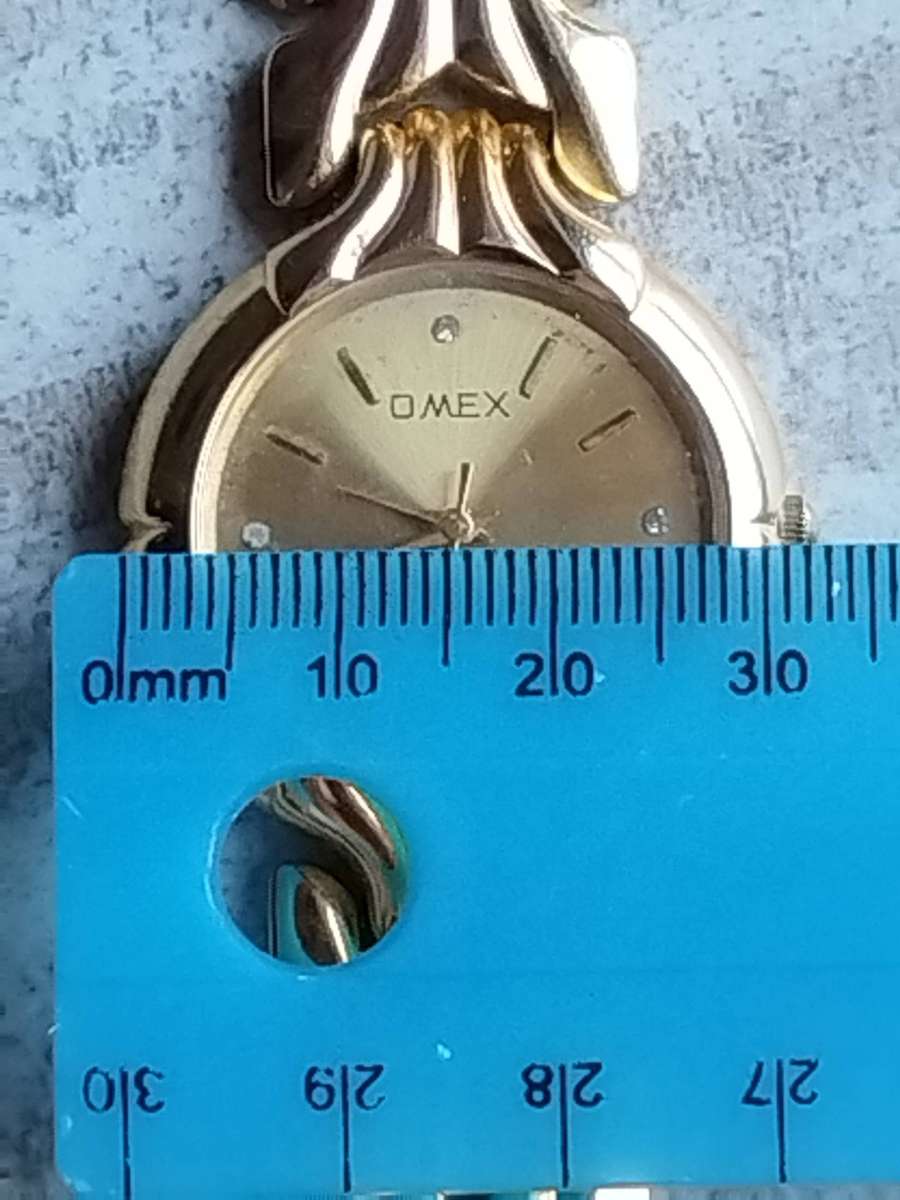 MENS GOLD OMEX WATCH IN EXCELLENT WORKING CONDITION