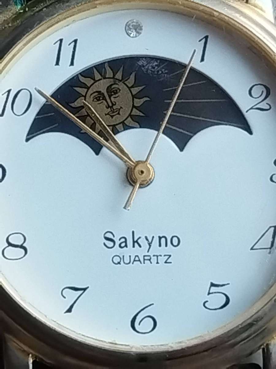 MENS VINTAGE  SAKYNO SUN/MOON WATCH IN EXCELLENT WORKING CONDITION