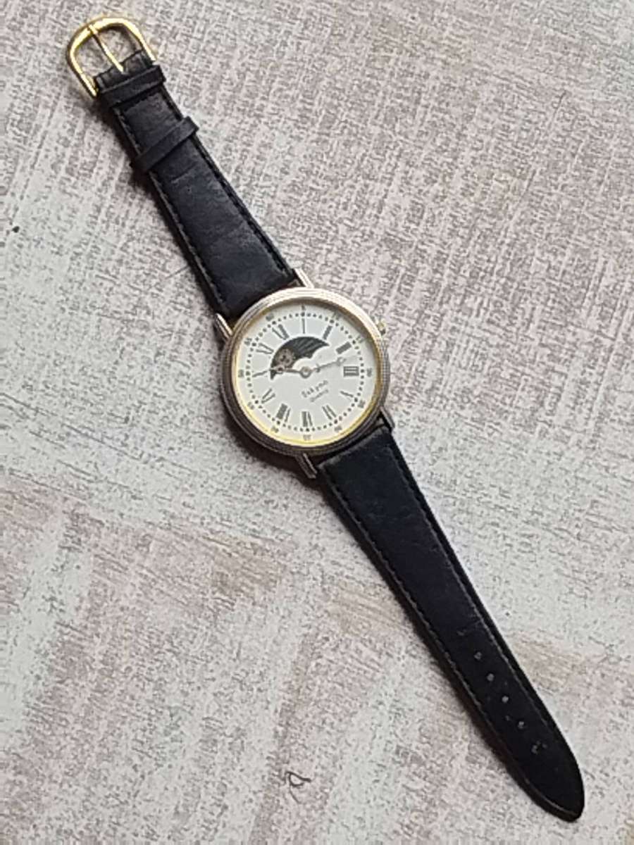 LADIES SAKYNO SUN AND MOON ROTATING WATCH IN EXCELLENT WORKING CONDITION