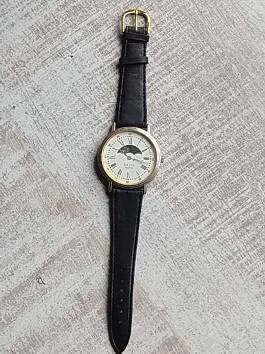 LADIES SAKYNO SUN AND MOON ROTATING WATCH IN EXCELLENT WORKING CONDITION