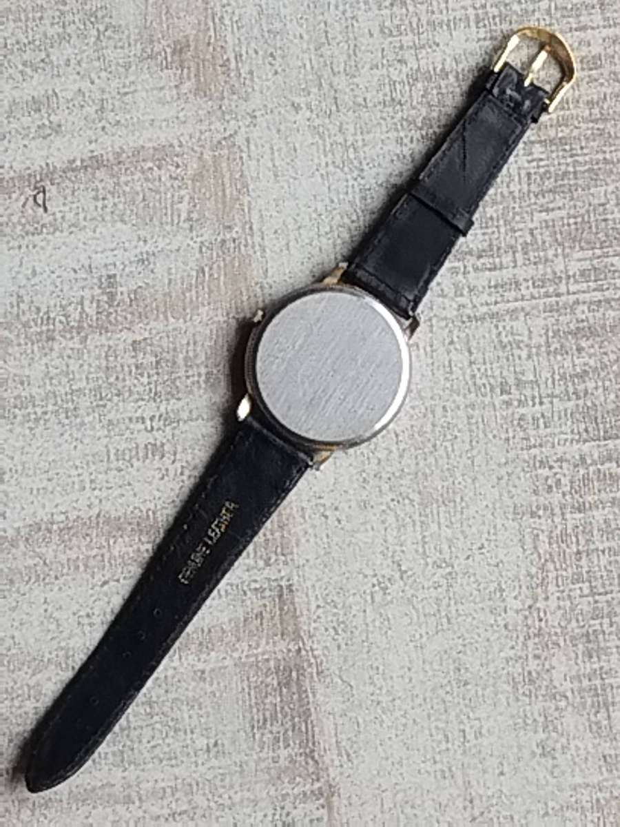 LADIES SAKYNO SUN AND MOON ROTATING WATCH IN EXCELLENT WORKING CONDITION