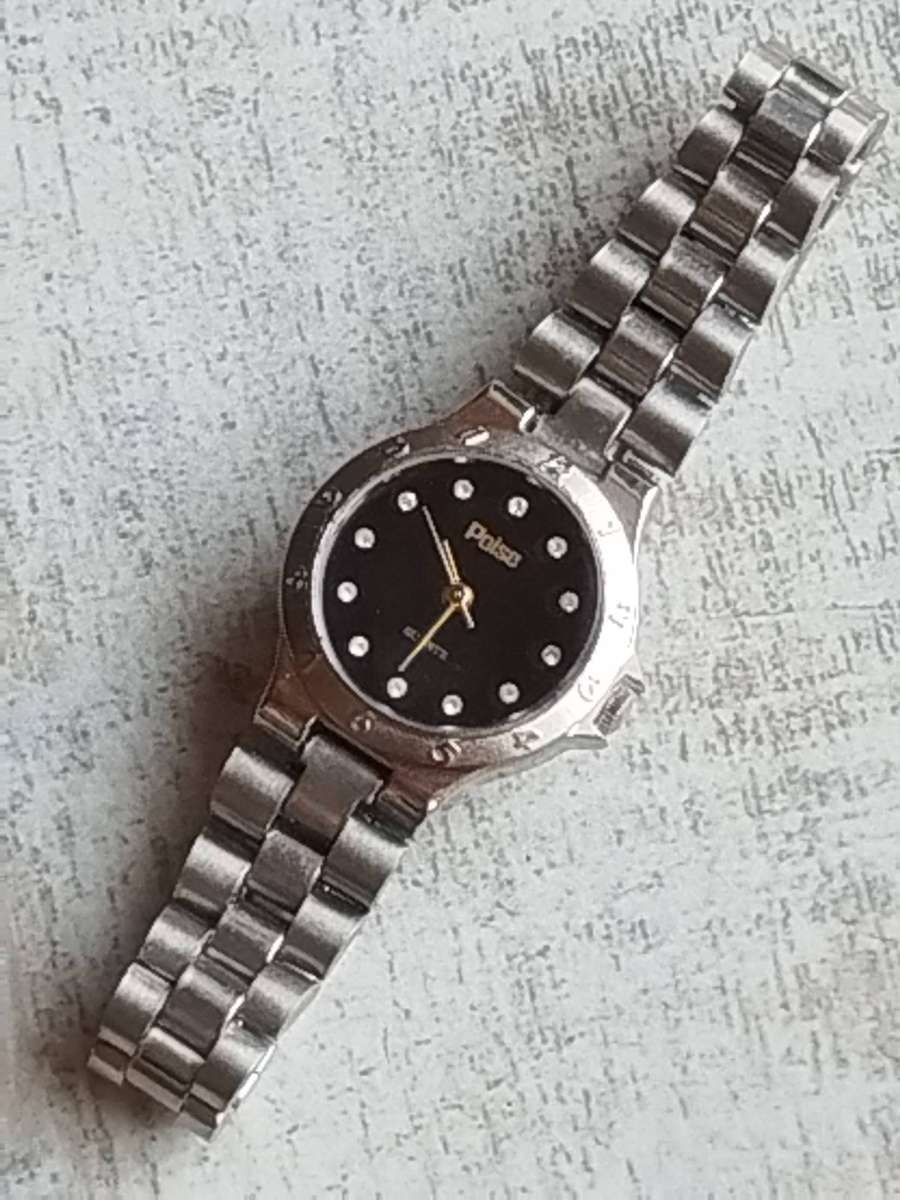 LADIES POISE STAINLESS STEEL WATCH IN EXCELLENT WORKING CONDITION