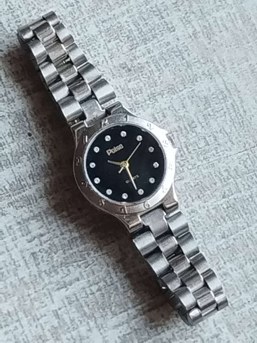 LADIES POISE STAINLESS STEEL WATCH IN EXCELLENT WORKING CONDITION