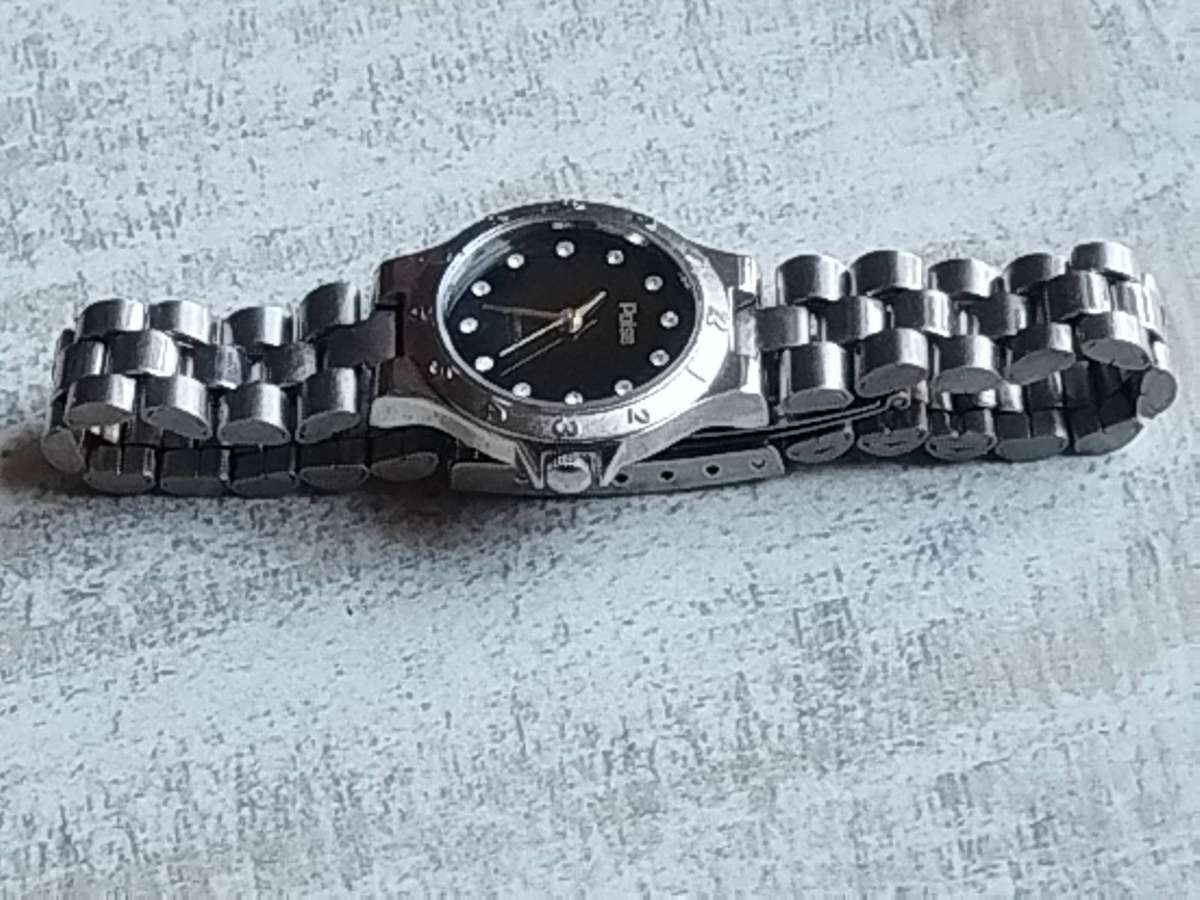 LADIES POISE STAINLESS STEEL WATCH IN EXCELLENT WORKING CONDITION