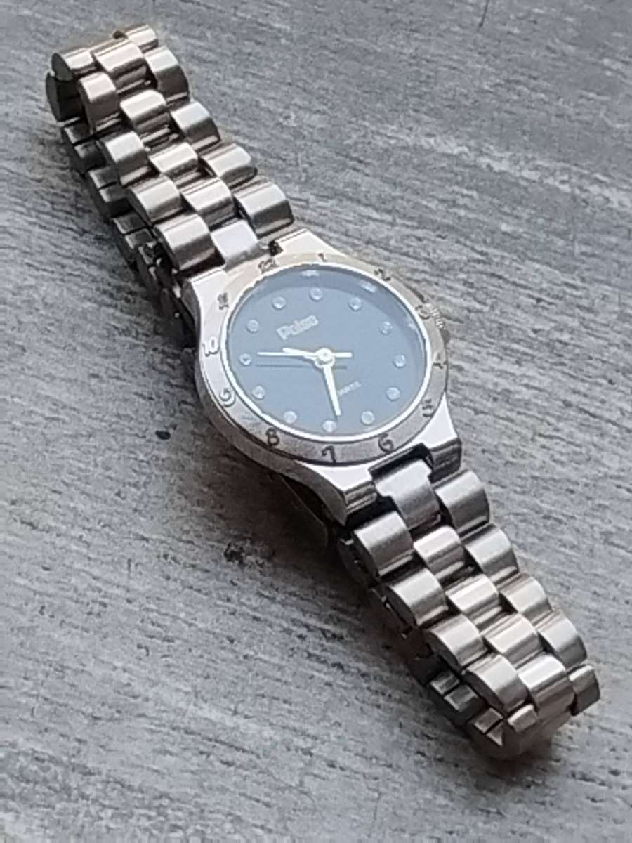 LADIES POISE STAINLESS STEEL WATCH IN EXCELLENT WORKING CONDITION