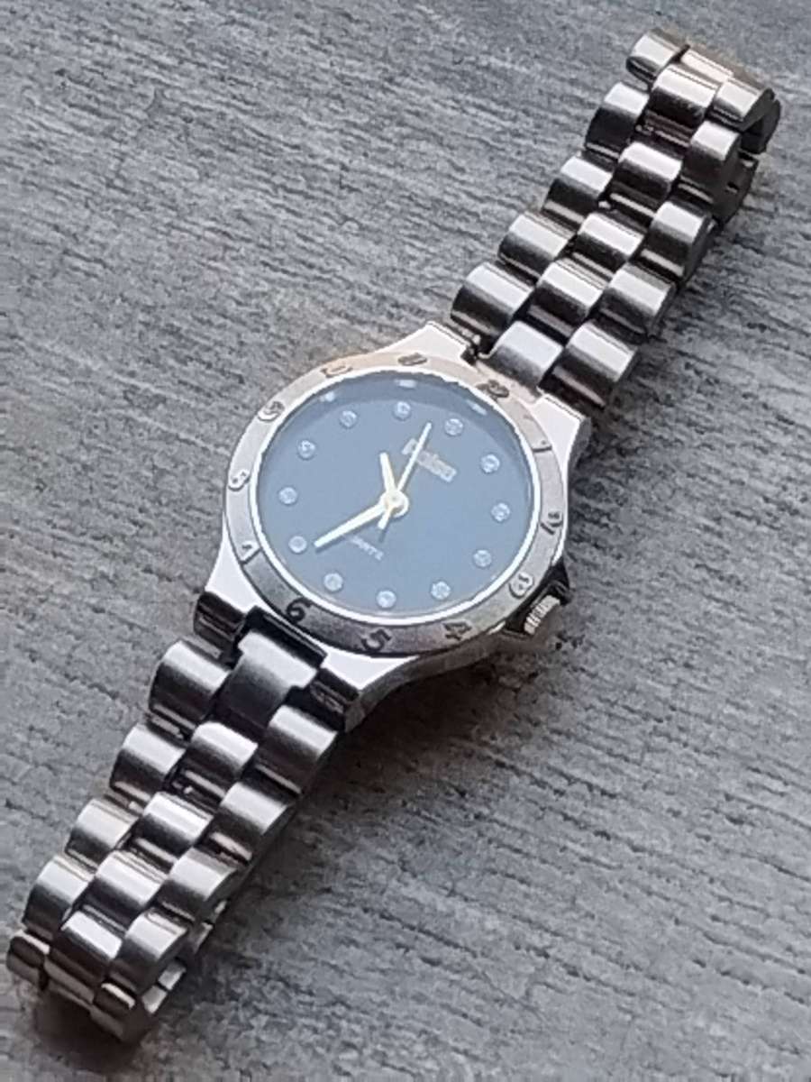 LADIES POISE STAINLESS STEEL WATCH IN EXCELLENT WORKING CONDITION
