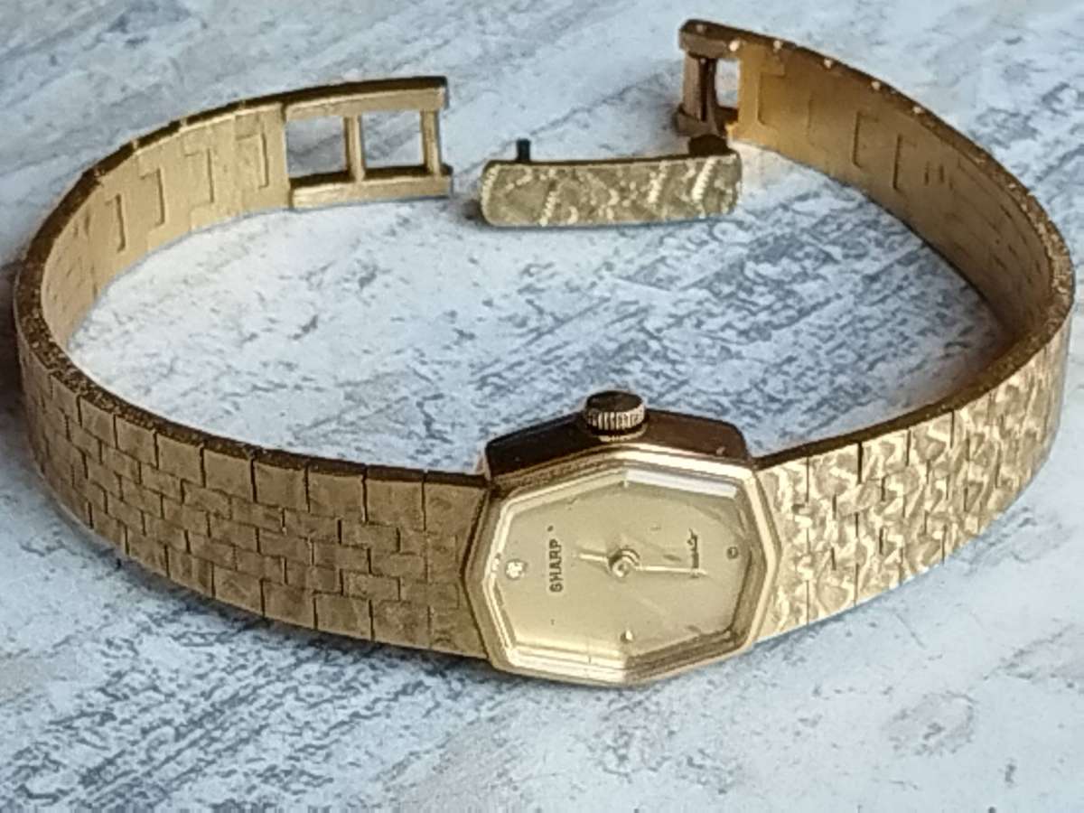 LADIES VINTAGE GOLD SHARP WATCH IN EXCELLENT WORKING CONDITION